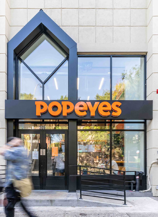 Popeyes storefront in Greenwich Village, New York, designed by Zelta Design